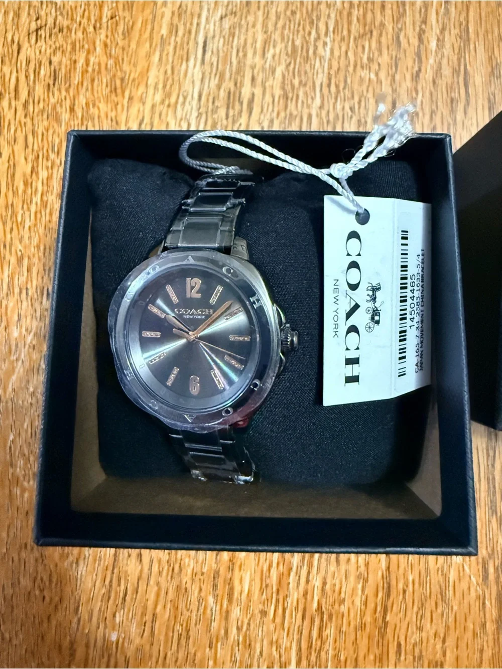Coach Women’s Silver Bracelet Watch with Gray Dial and Gold Accents